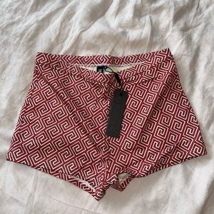 NWT Triangle Celeste swim short in Baie colorway. Size M